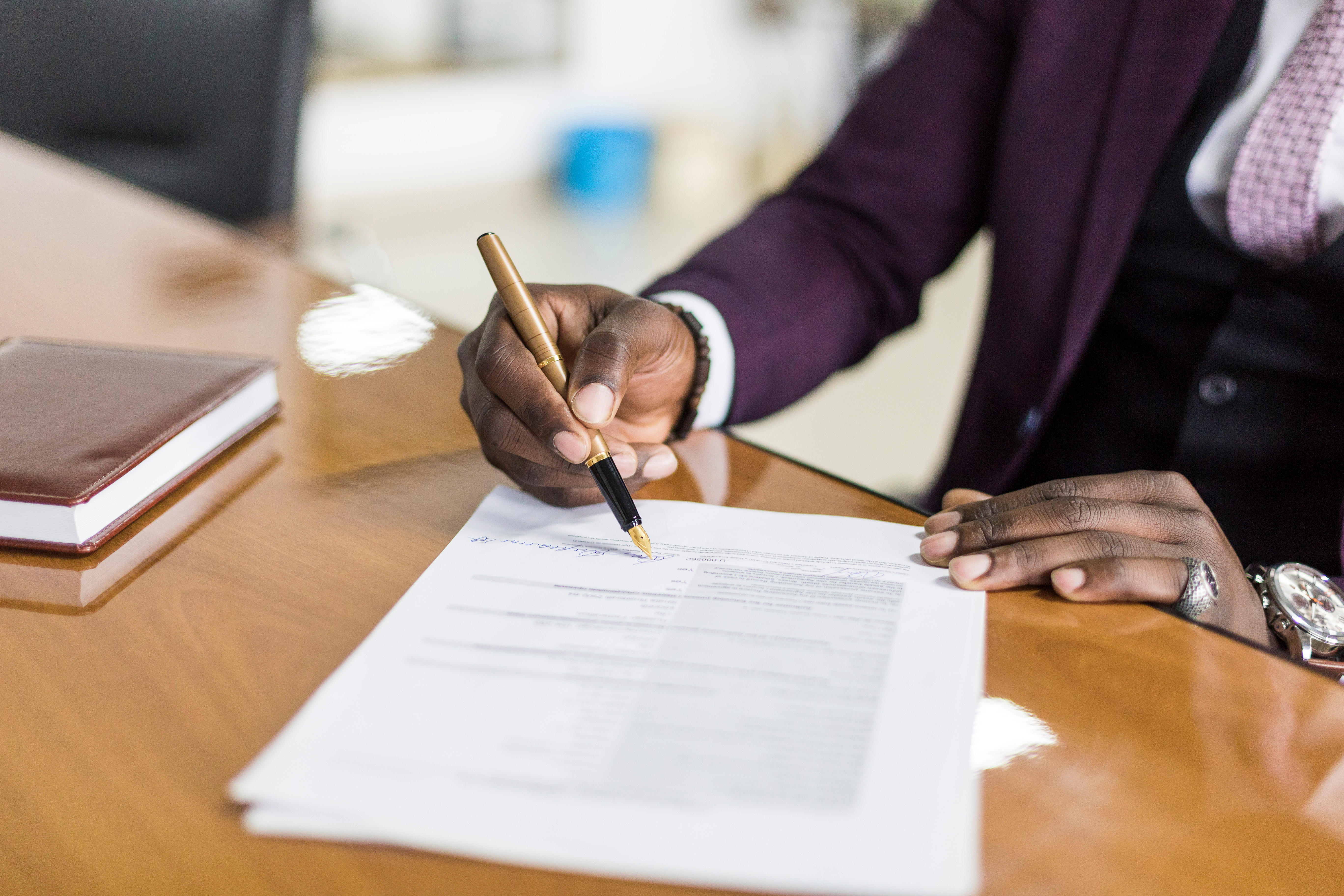 Man Reviewing A Contract